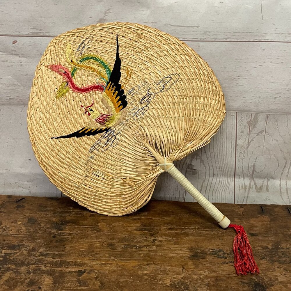Vintage hand-woven palm leave embroidered fan